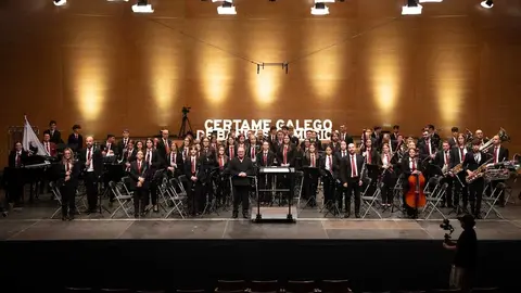La banda de la Agrupaci&oacute;n, en un reciente certamen gallego.