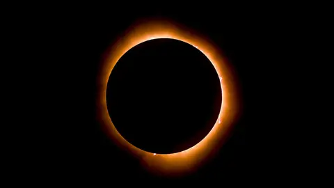 dramatic-total-solar-eclipse-glowing-against-black-2026-03-18-07-00-02-utc